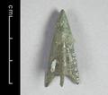 Socketed arrowhead with a triangular body and notched corners. Made of  bronze.;