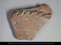 Wall sherd of a vessel made of red clay. The outside has been decorated with straight and wavy incised lines. Additionally, a raised band of clay is visible which has been deeply notched at regular intervals.