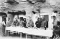 Photograph from Needham archives of a party held at Mogao, Dunhuang, hosted by James and Lucy Lo..