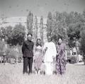 Photograph of Chang Shuhong, Sudarshana Devi Singhal, Raghu Vira and colleague near the Dunhuang Mogao caves taken in 1955.