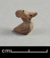 Clay figurine of a bird, probably a hoopoe. The bird is shown with folded wings, a large beak and a crest. Details such as the feathers are rendered using incised lines. Both the crest and the beak have been pieced for supension.;