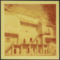 Photograph of the exterior of the Dunhuang Mogao caves taken by Raghu Vira in 1955.