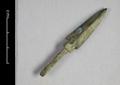 Arrowhead, stemmed, with a triangular body and notched corners. Made of bronze.