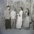 Photograph of the Raghu Vira, Sudarshana Devi Singhal and members of the Dunhuang Institute in Dunhuang Mogao Cave 3 taken on 4 June 1955.