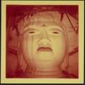 Photograph of the head of the large Maitreya Buddha statue in Dunhuang Mogao Cave 96 taken by Raghu Vira in 1955.