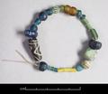 String of 25 glass beads of different shapes and colours.;