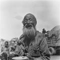 Old man, possibly monk or priest, in Gansu, 1948.