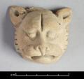 Terracotta lion mask.