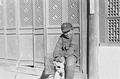 Boy outside a house at Yumen, Gansu, taken on Joseph Needham's 1943 visit to Dunhuang.