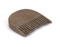 Small wooden comb with a strongly arched top. Some of the widely spaced and short teeth have broken off.;