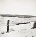 Photograph across the Dang River at Dunhuang Mogao to the stupas with Irene Vincent taken in 1948.