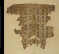 Fragment of printed copy of Zazi Tangut dictionary, originally tied with string.