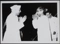 Photograph of Prime Minister Pt. Jawaharlal Nehru and Raghu Vira at the New Delhi exhibition of acquisitions from China taken in 1955.