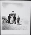 Photograph of Raghu Vira with members of the Dunhuang Institute near the Dunhuang Mogao caves taken in 1955.