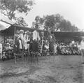 Theatre performance on stilts in Shichahai, Beijing, China, taken by Irene Vincent in 1948.