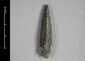 Arrowhead, stemmed, with a triangular body and notched corners. Made of  bronze.