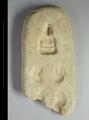 Mould for casting seated Buddha, pair of curls and locks of hair.