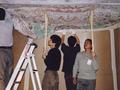 Li Xiaoyu, Li Tao, Liu Gang and Bai Xinzhong from the Dunhuang Academy installing the replica of Dunhuang Mogao Cave 45 at the British Library exhibition, 'The Silk Road: Trade, Travel, War and Faith', May 2004.