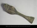 Bronze object, probably the leg of a vessel. The object has the shape of an animal's leg with a hoof. It was cast in bronze, decorated with incised lines and gilded.;