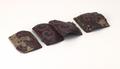 Fragment of armour consisting of four rectangular scales. The scales were made of leather and covered with several layers of black and red lacquer. They were then decorated with a comma-shaped pattern.;